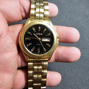 Lorus Mens Quartz Watch Gold Tone Black Day Date Dial LR 0241 WR 30M working